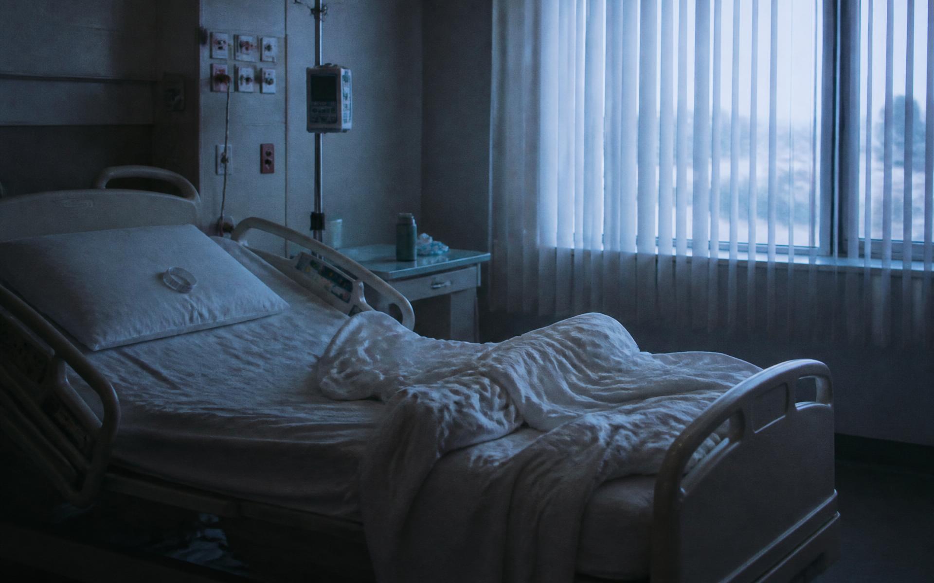 An empty hospital bed